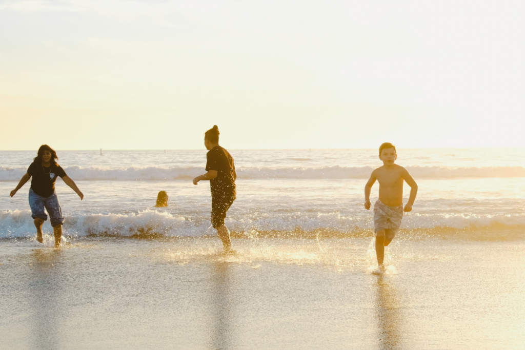 A Family Enjoying The Beach